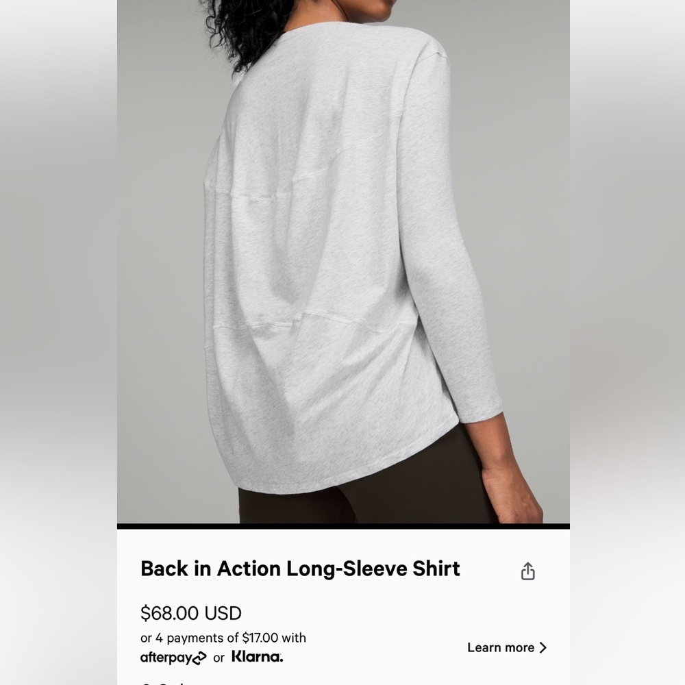 Gray lululemon back in action shirt.